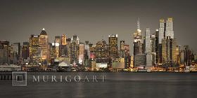 Illuminated Manhattan skyline at twilight - New York City